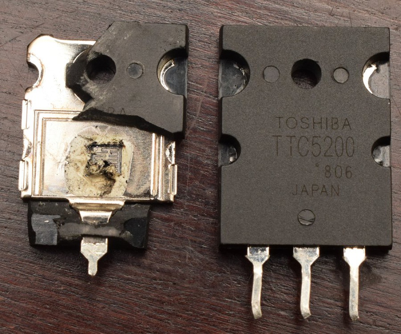 counterfeit transistor (Toshiba TTC5200) broken open to reveal silicon die